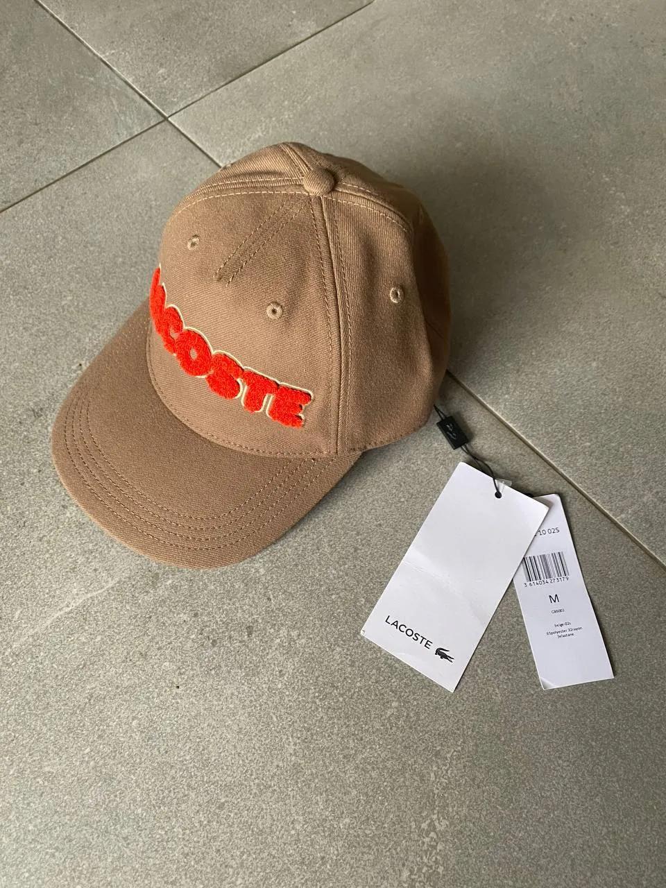 Мужские кепки Lacoste и New Era