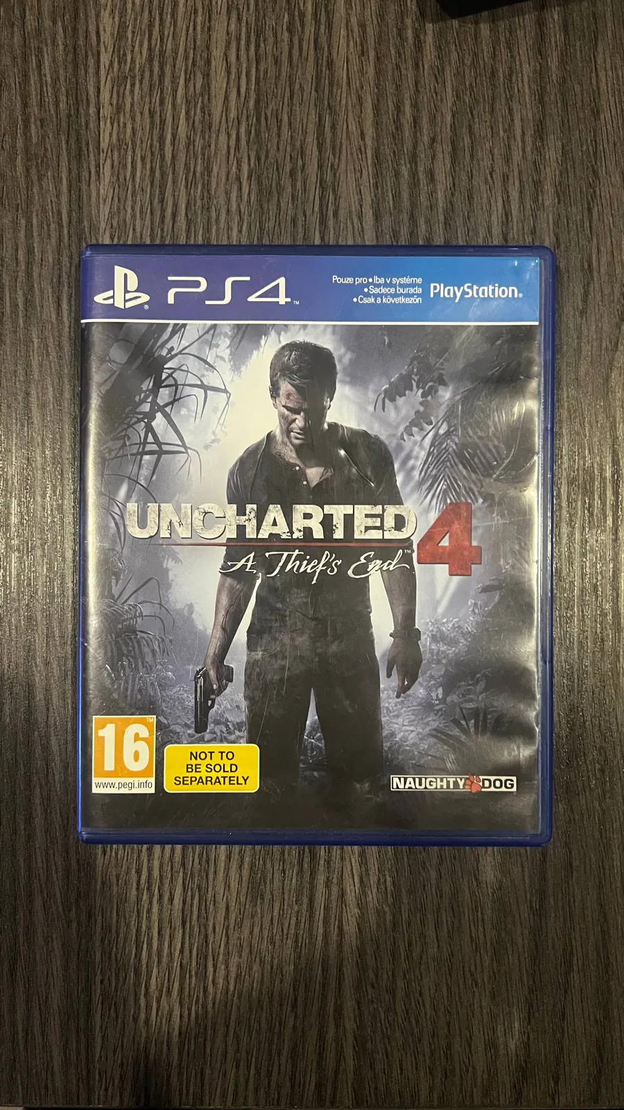Диск с игрой Uncharted 4 для PS4 1